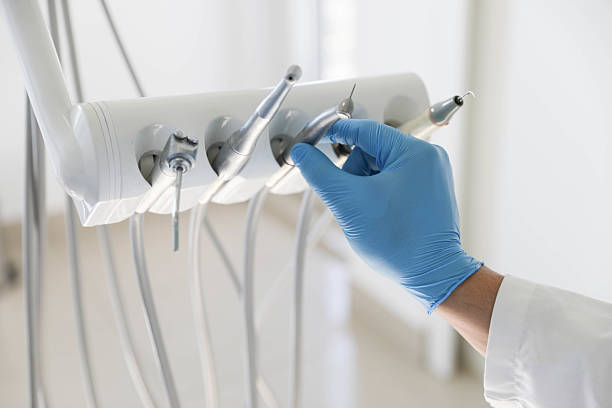 Professional Tooth Extraction technician working in Princeton Meadows, NJ
